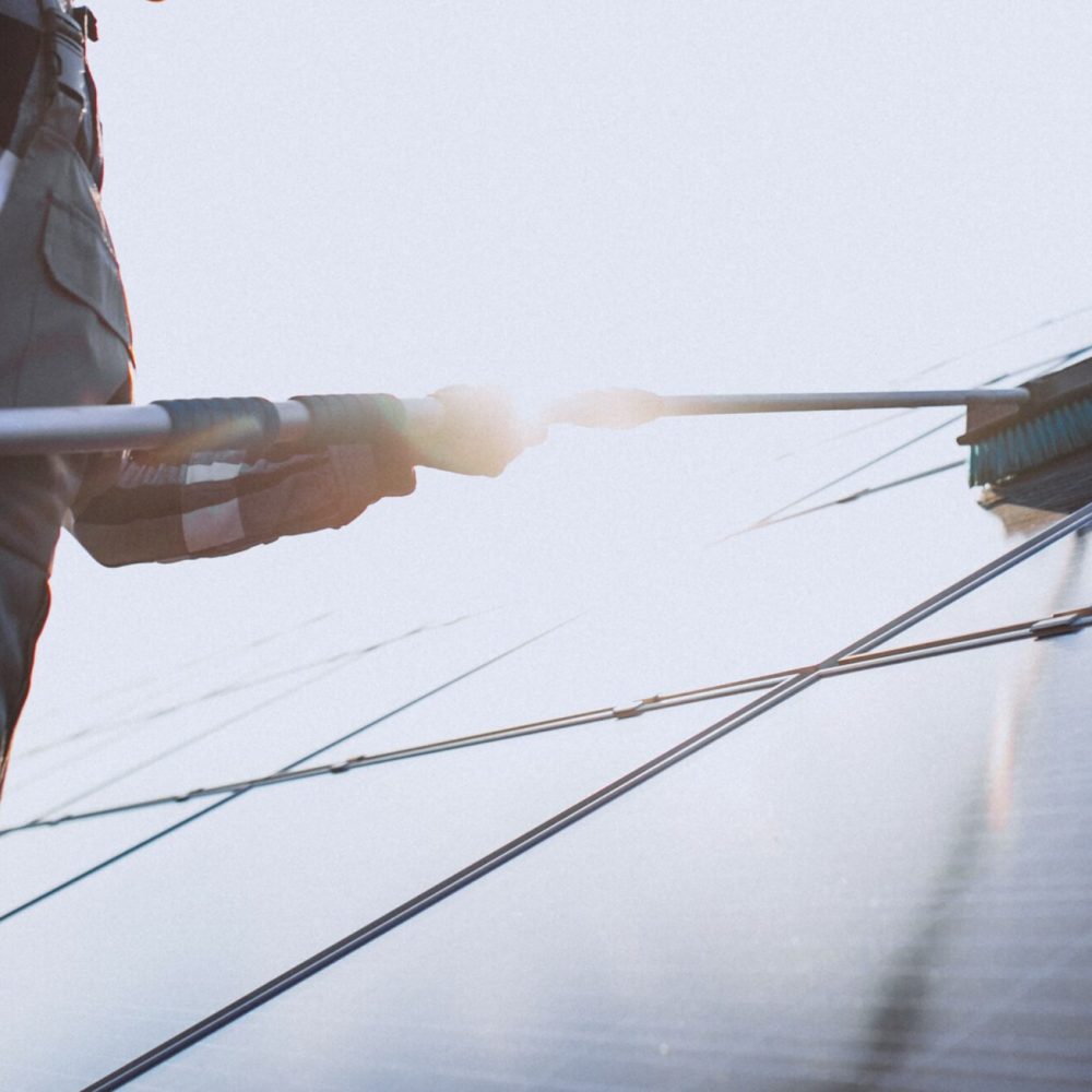 man-worker-firld-by-solar-panels